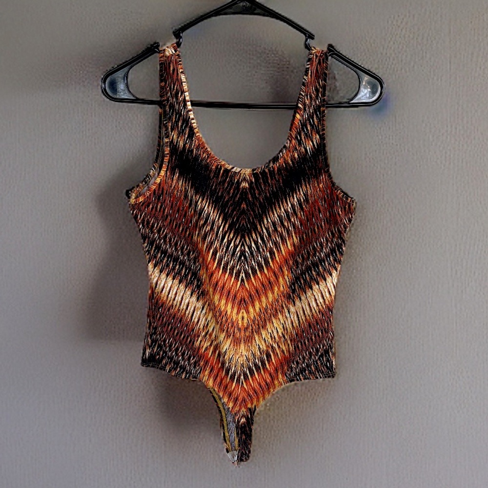 Guess one piece bodysuit with snaps at the bottom